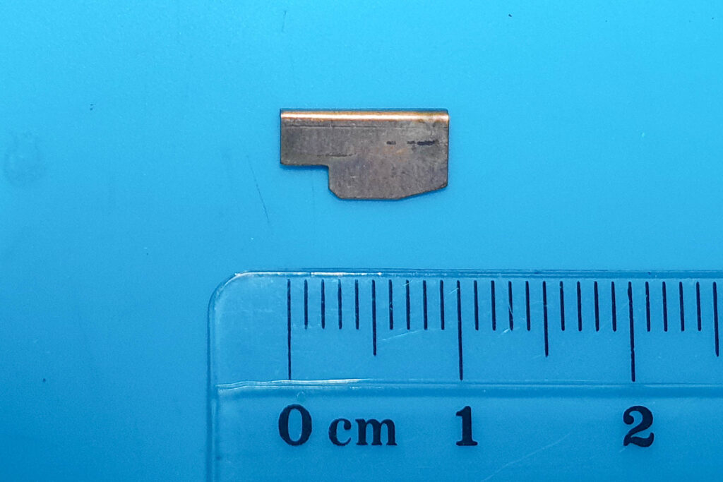 Canon A-1: Mystery Part - Tiny copper part, fell off during disassembly, is a special spacer