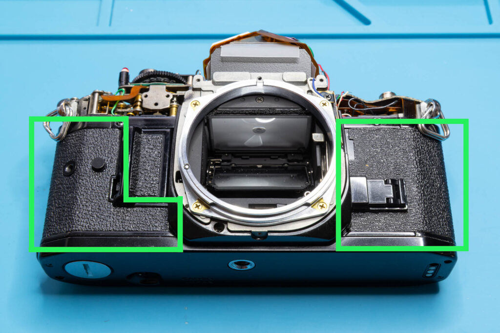 Canon A-1: Removal of mirror box - Front leatherette (consisting of two parts) before removal