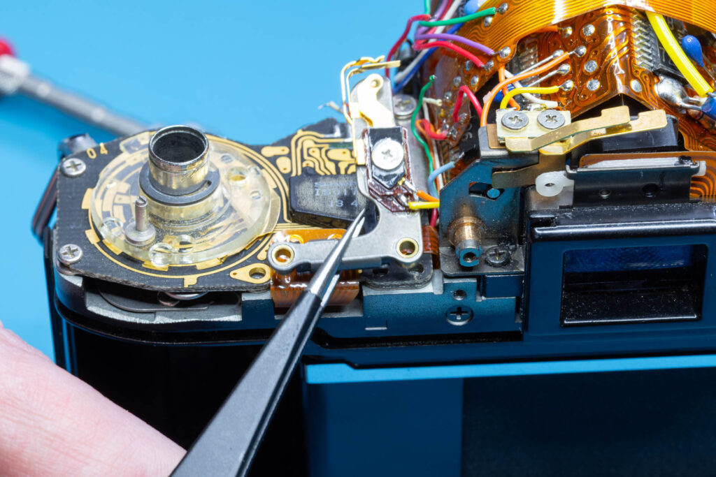 Canon A-1: Removal of mirror box - Lift off the DD connector plate