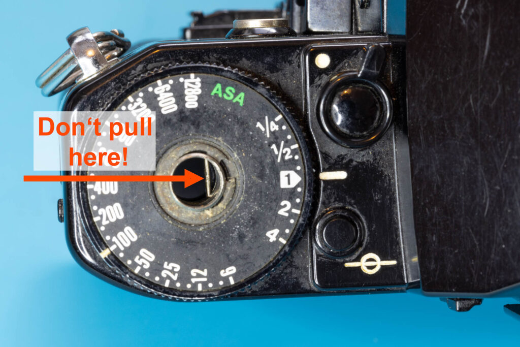 Canon A-1: How to Open the Back Cover - Warning: Don't pull on the small metal bar