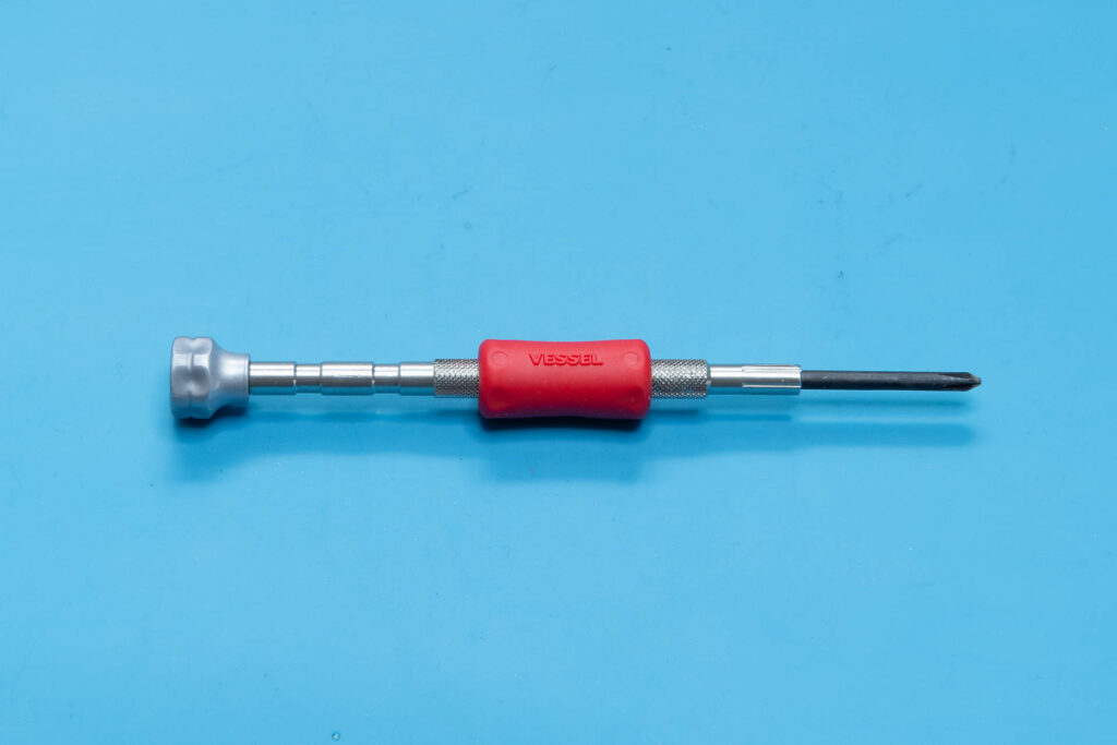 Canon A-1: Necessary tool for removal of bottom cover