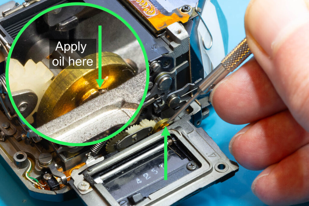 Canon A-1: Apply oil here to fix the "Canon cough"