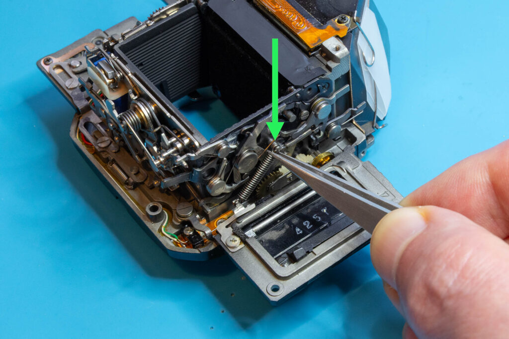 Canon A-1: Remove mirror-lifting spring from mirror-control unit
