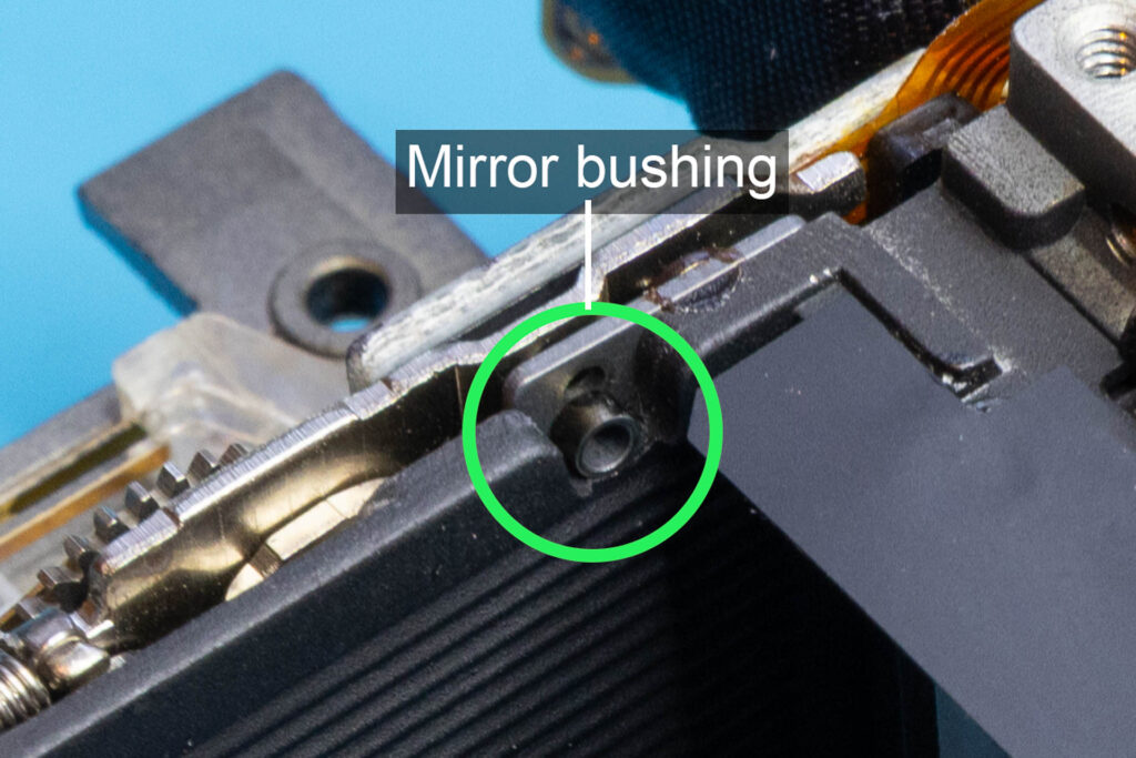Canon A-1: Bushing for the pivot of the mirror