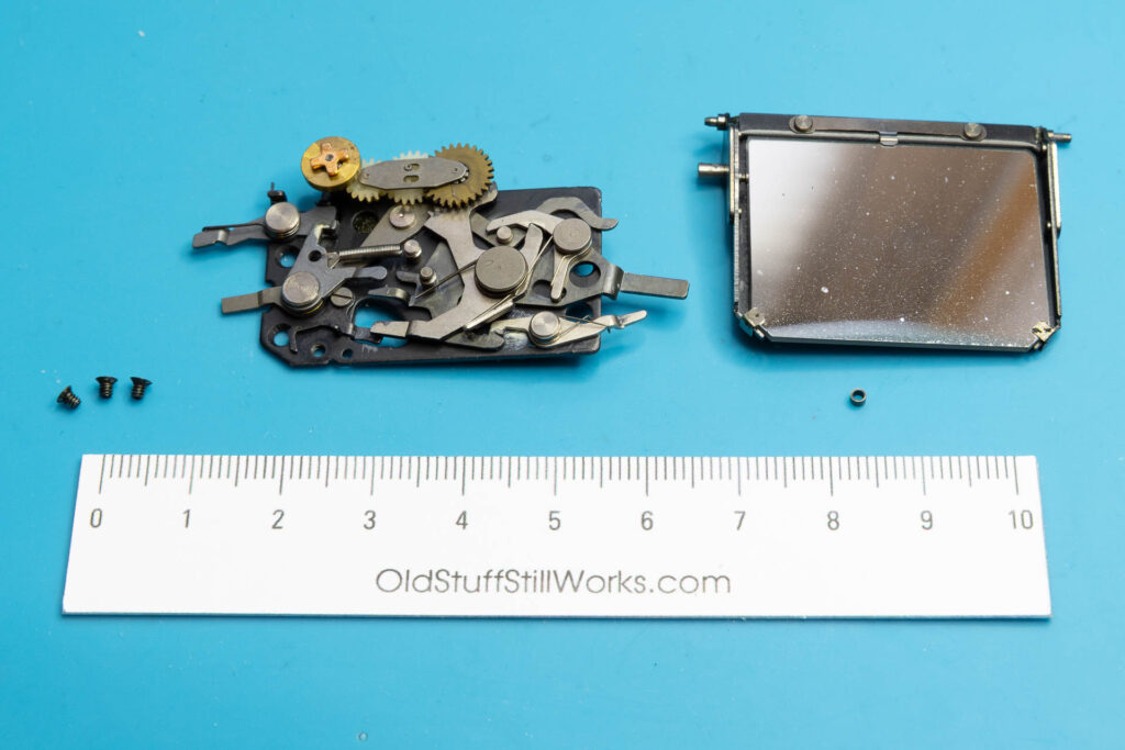 Canon A-1: Removal of mirror-control unit - Parts removed in Step 3