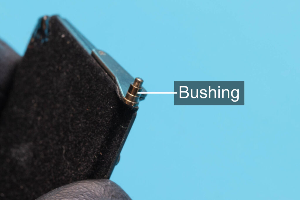 Canon A-1: Bushing on left pivot of mirror