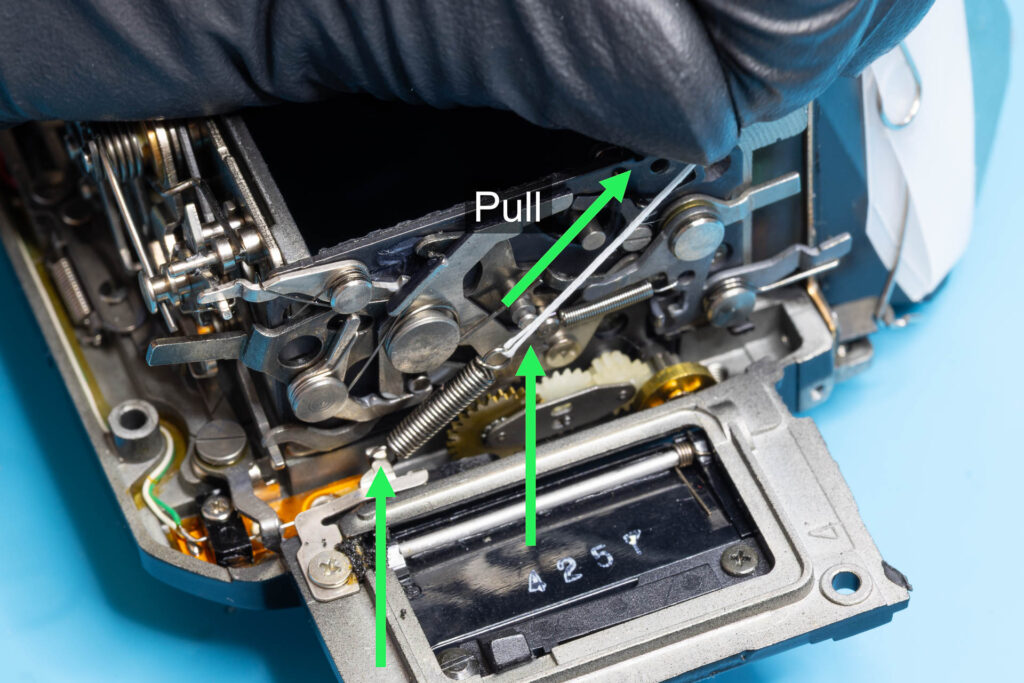 Canon A-1: Install the mirror-lifting spring