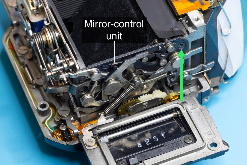 Canon A-1: Fasten the mirror-control unit