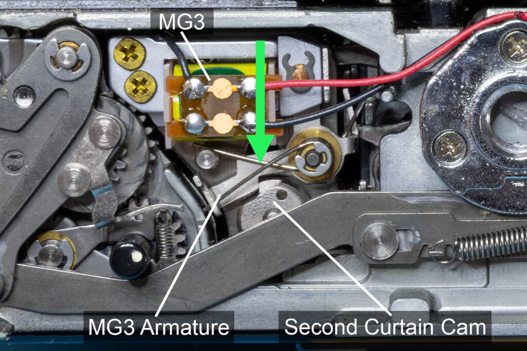 Canon A-1: Shutter mechanism on the bottom of the camera when shutter is cocked (MG3)