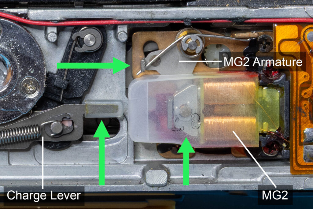 Canon A-1: Shutter mechanism on the bottom of the camera when shutter is cocked (MG2)