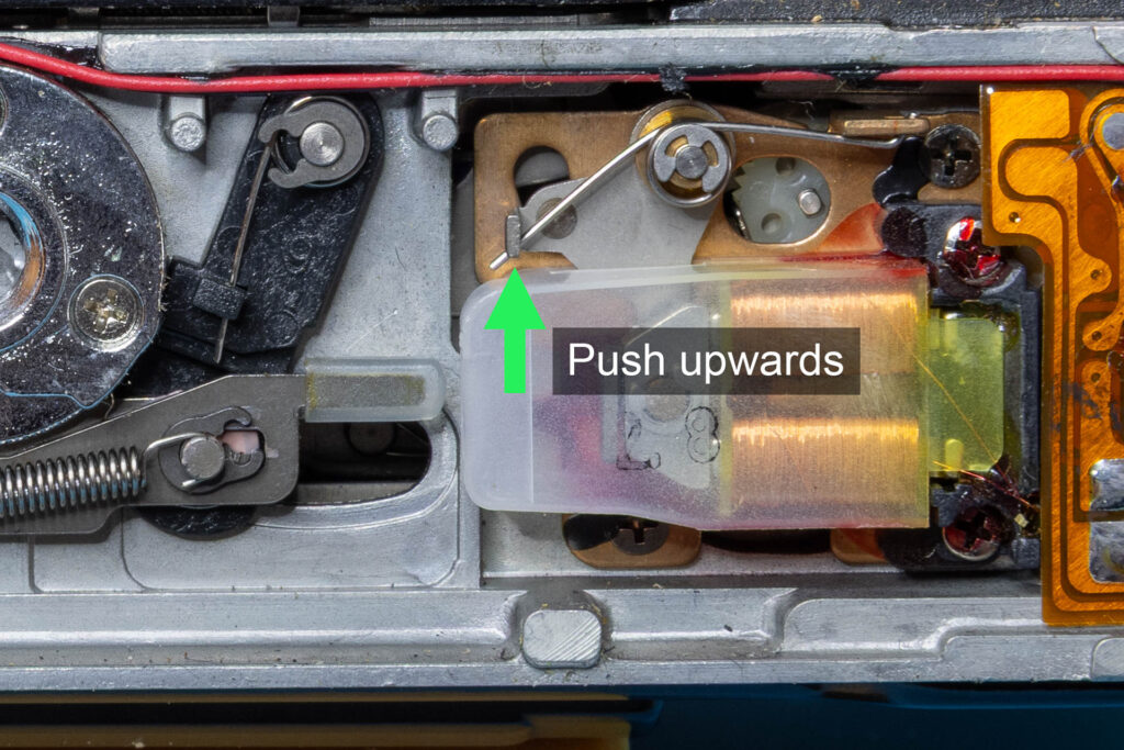 Canon A-1: Releasing the shutter by pushing the MG2 armature upwards