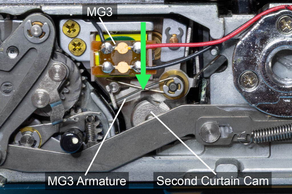 Canon A-1: Shutter mechanism on the bottom of the camera when shutter is not cocked (MG3)