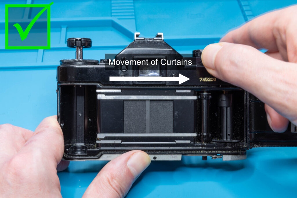 Canon A-1: Movement of curtains when cocking the shutter