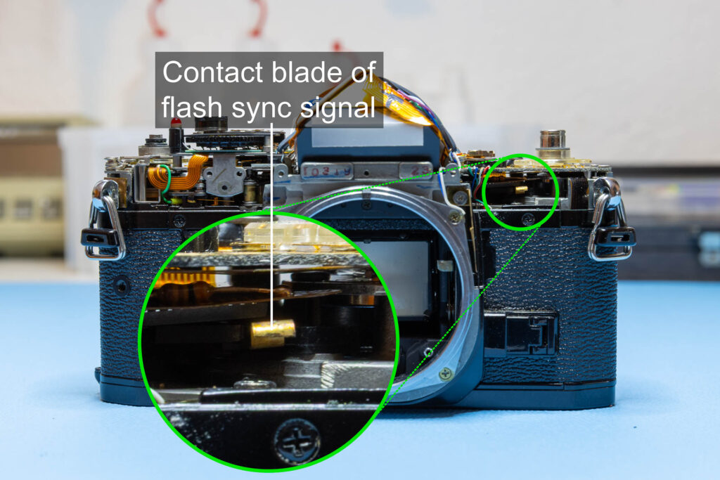 Canon A-1: Model variation - Contact blade instead of wire for flash sync signal