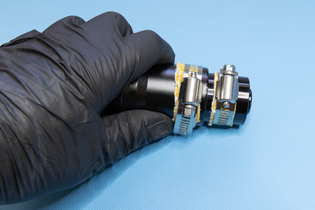 Elmo f1.2 25-50mm: Place hose clamps on middle and rear section of lens barrel