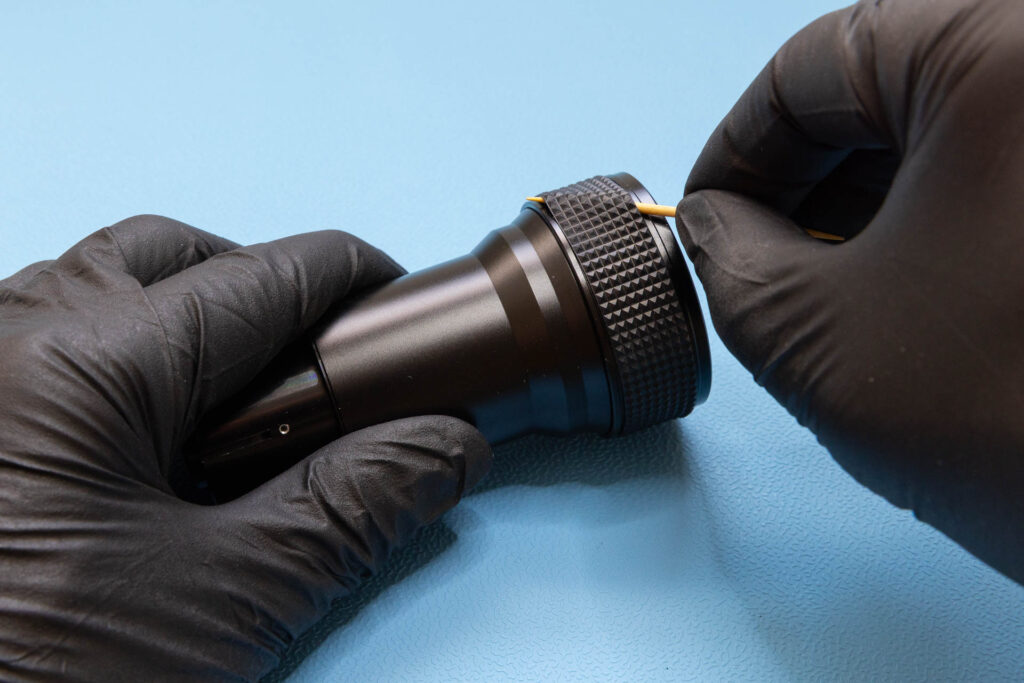 Elmo f1.2 25-50mm: Removing the zoom grip rubber ring