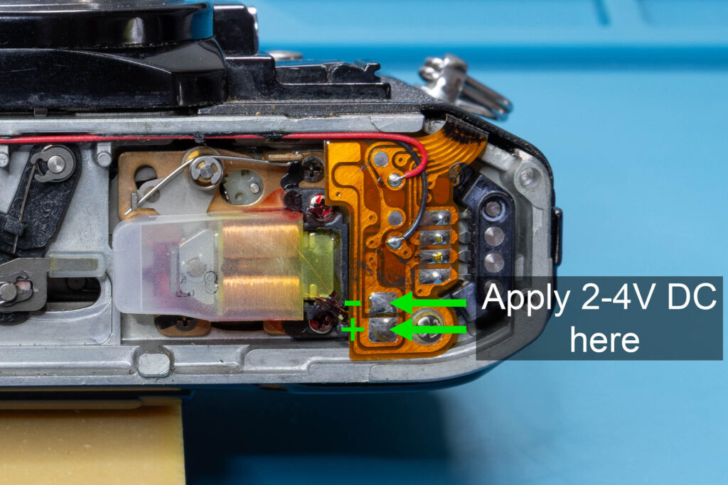 Canon A-1: Apply external test voltage to release magnet MG2