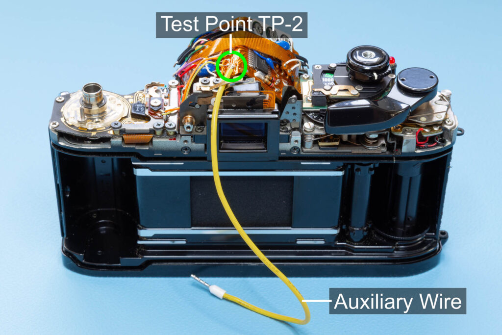 Canon A-1: Auxiliary wire soldered to test point TP-2 (to grab the SYNC signal)